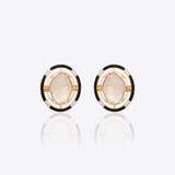 14k gold stud earrings with Polki, black enamel, and diamond accents.