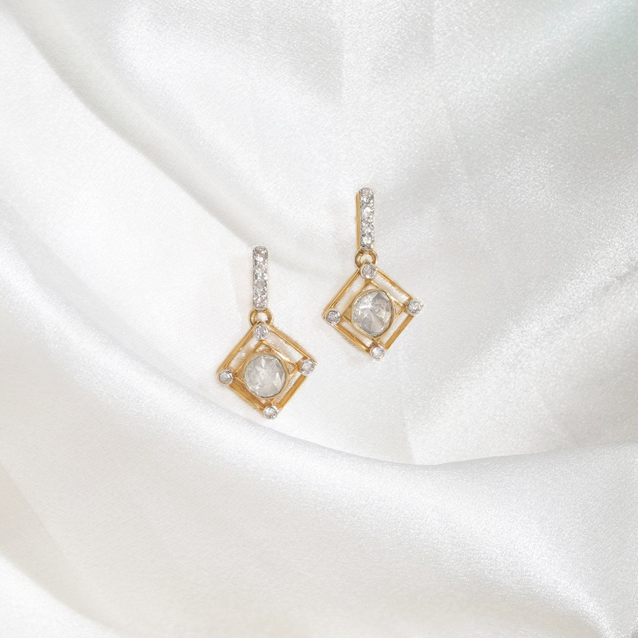 Evelyn earrings styled with muted outfit for a regal yet refined look.