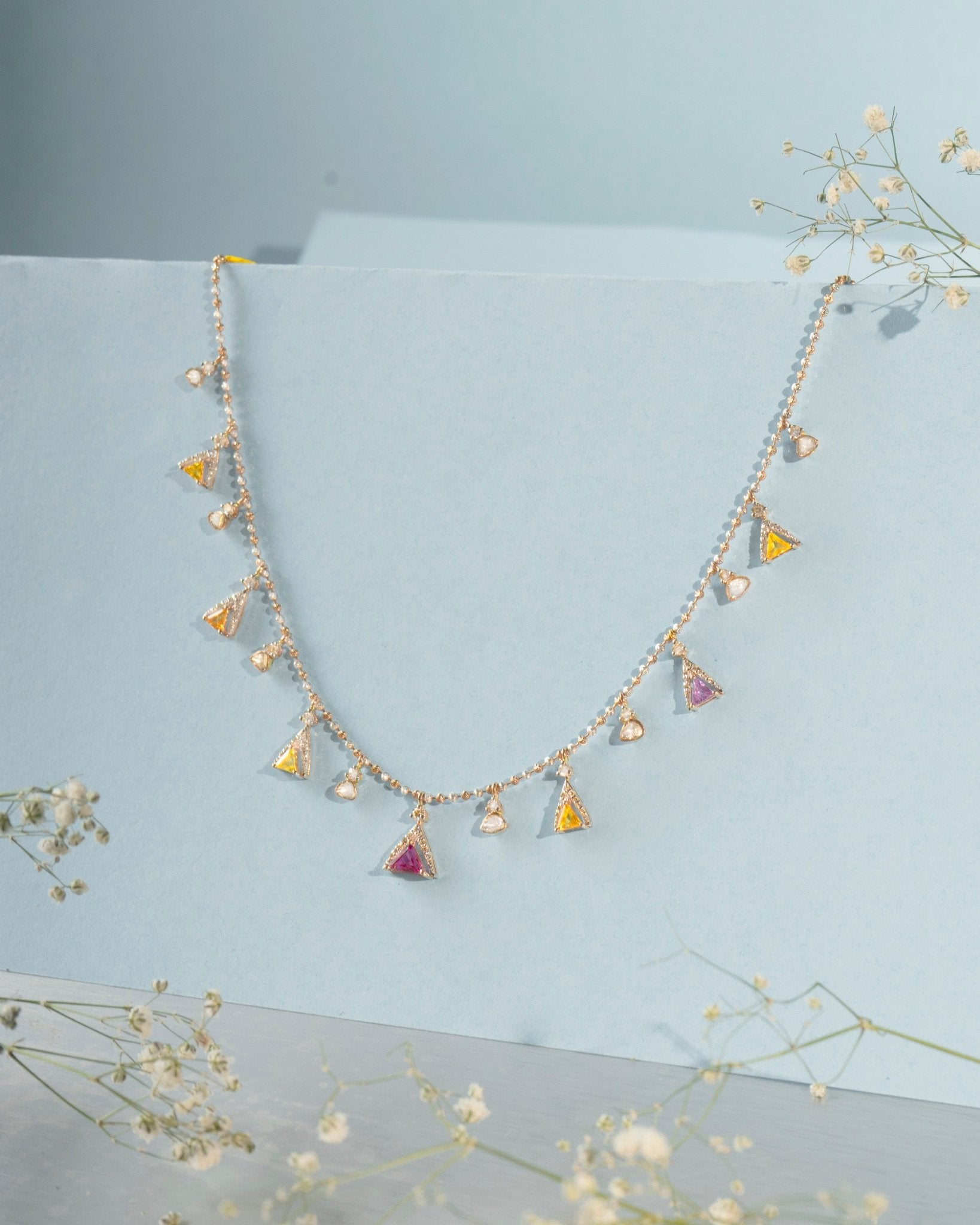 Gemstone Garland Necklace in 14K gold with colourful gemstones and Polki drops.