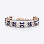 Starlight Sapphire Bracelet in 14K gold with radiant sapphires in a refined design