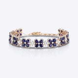 Starlight Sapphire Bracelet in 14K gold with radiant sapphires in a refined design